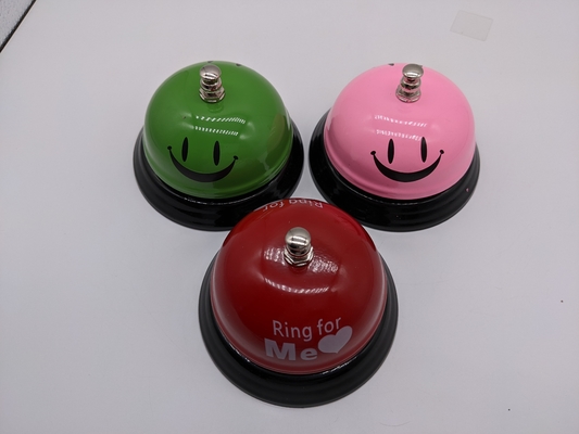 Servir eficientemente seus clientes com o Metal Smile Face Call Bell 85mm * 60mm 120g